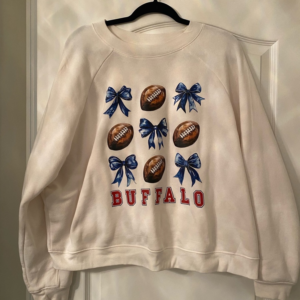Buffalo Women's Cream Sweater with Football and Bow Design